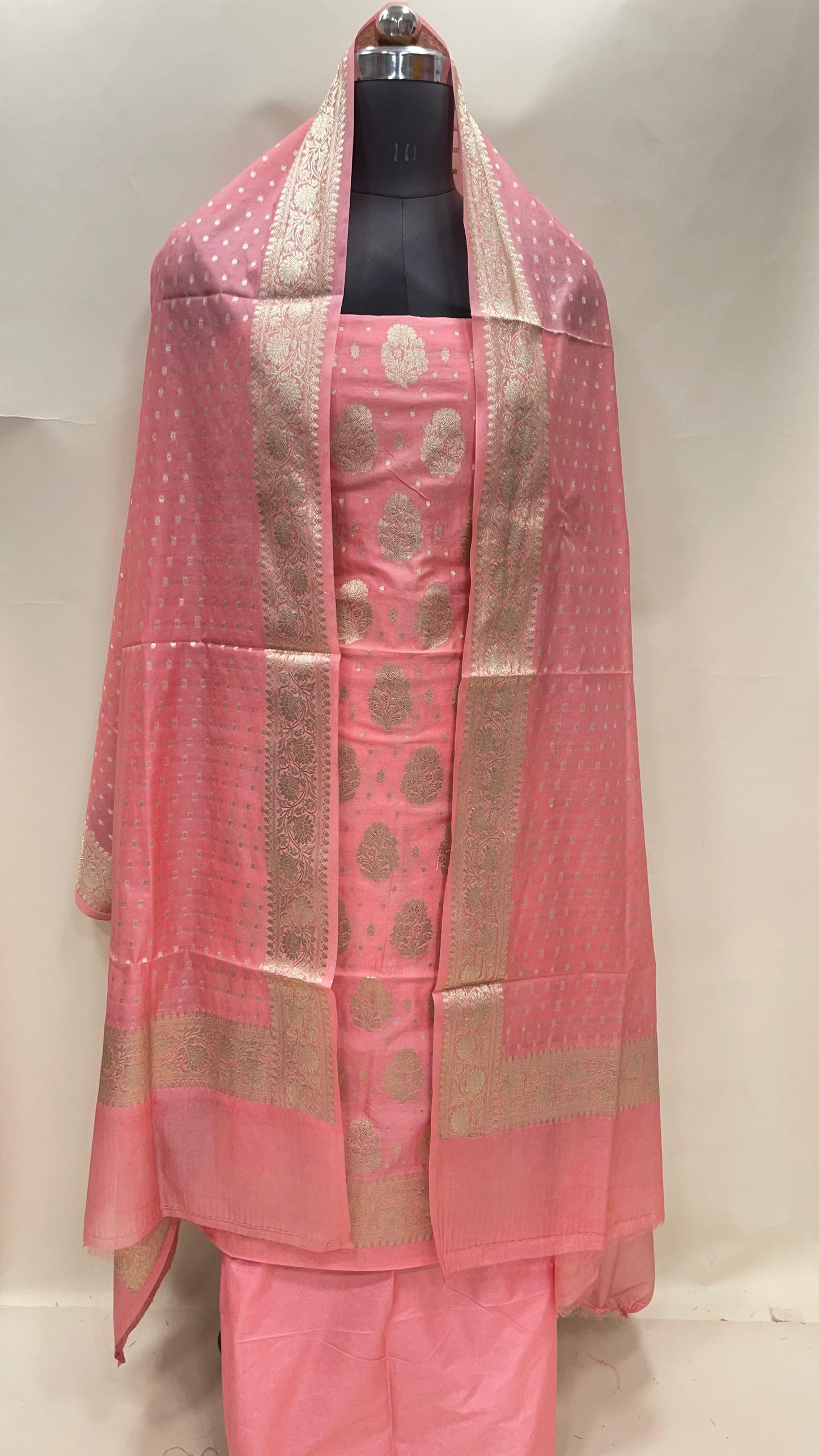 Peach semi-georgette suit set featuring floral silver zari bootis and matching dupatta. SHL_39