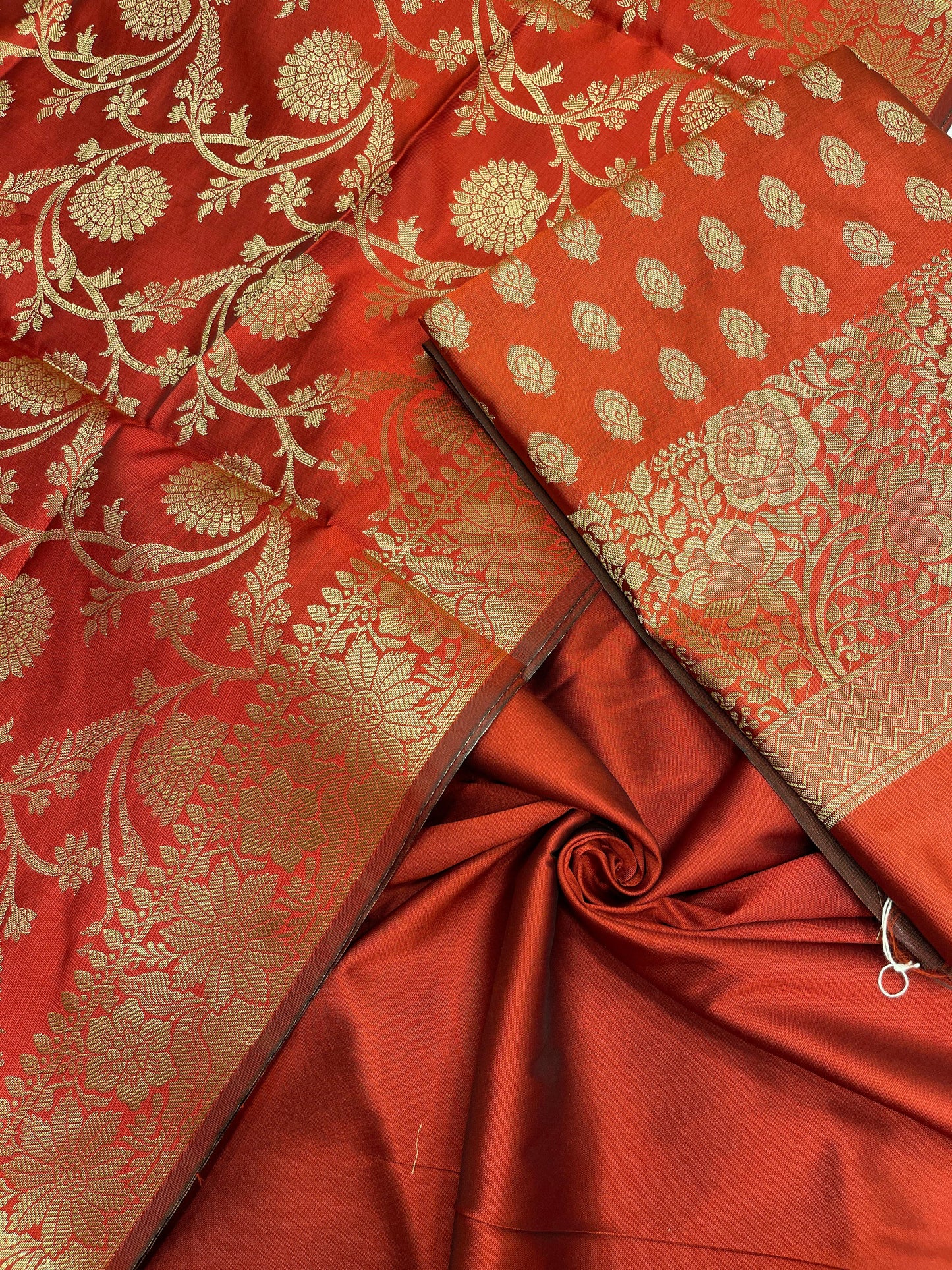 Red art silk suit set featuring floral zari bootis and matching dupatta. SHL_59