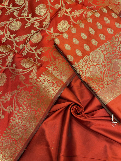Red art silk suit set featuring floral zari bootis and matching dupatta. SHL_59