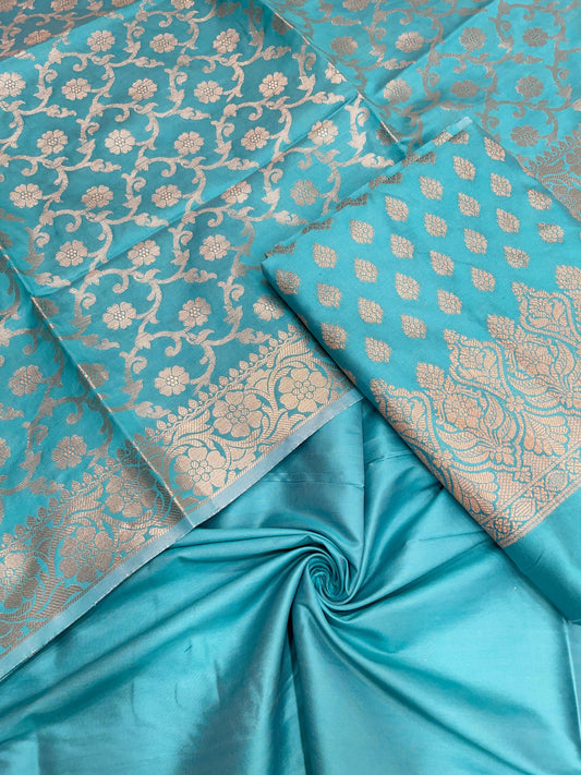 Rama green art silk suit set with floral zari bootis and matching dupatta. SHL_65