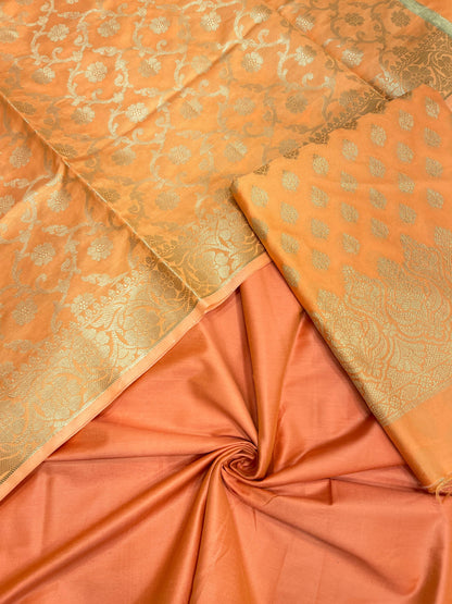 Peach art silk suit set with floral zari bootis and matching dupatta. SHL_63