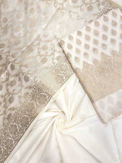 White art silk suit set with floral zari bootis and matching dupatta. SHL_64