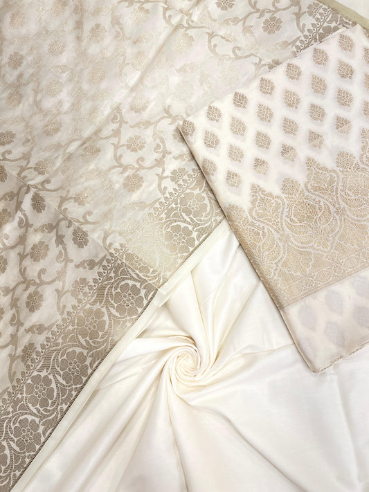 White art silk suit set with floral zari bootis and matching dupatta. SHL_64