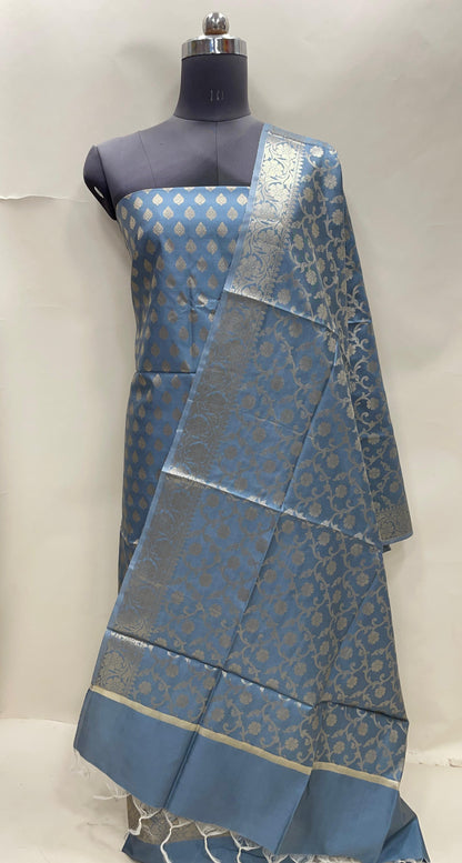 Grey art silk suit set featuring floral zari bootis and matching dupatta. SHL_66