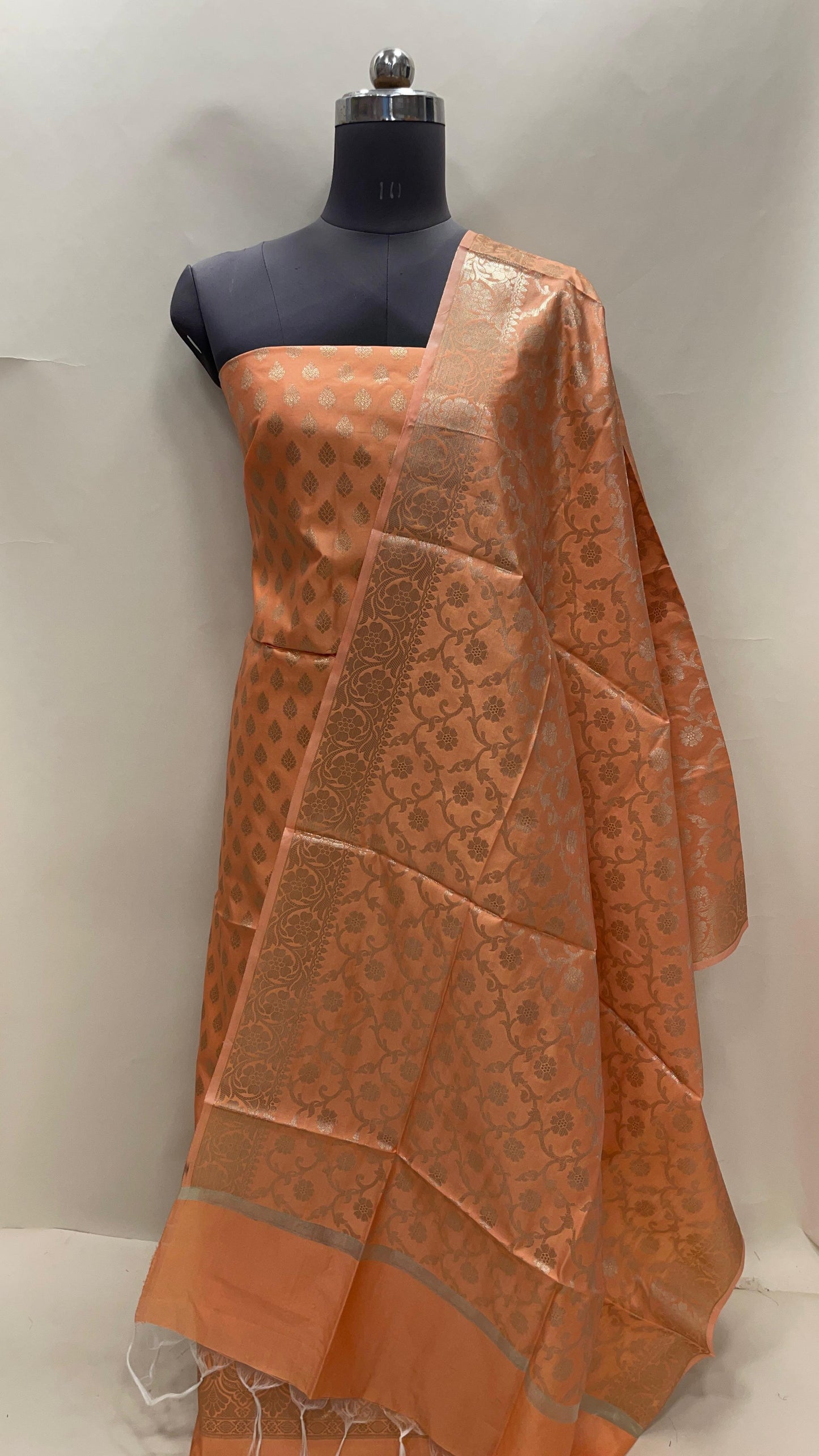 Peach art silk suit set with floral zari bootis and matching dupatta. SHL_63
