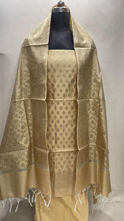 Cream art silk suit set featuring floral zari bootis and matching dupatta. SHL_62
