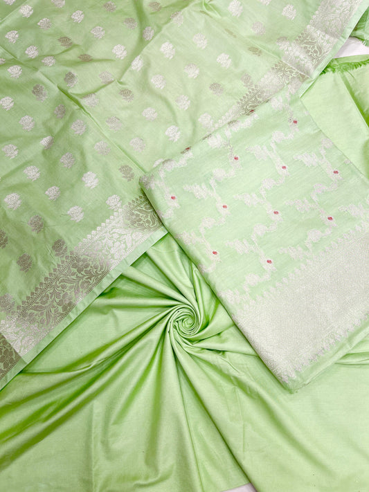 Light green katan chiniya silk suit set with floral silver zari mina jaal dupatta. SHL_50