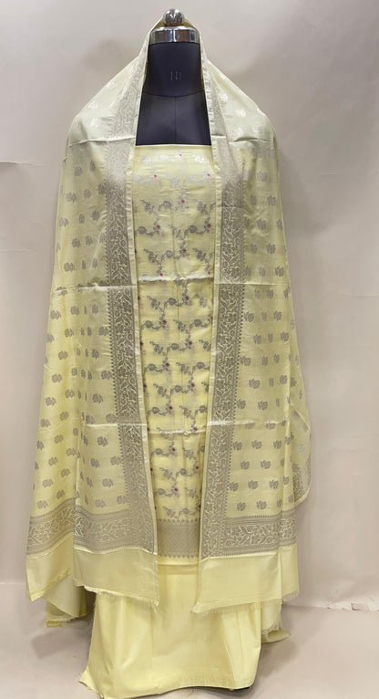 Yellow katan chiniya silk suit set with floral silver zari mina jaal dupatta. SHL_44