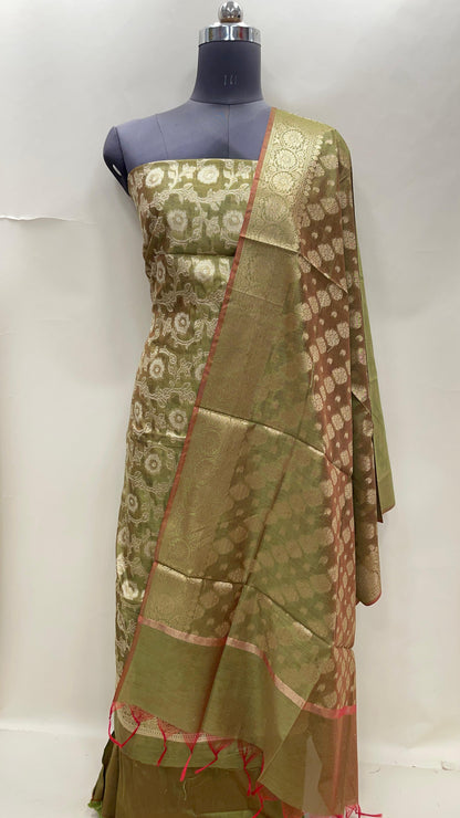Pistachio green cotton suit set with zari resham mina jaal and matching dupatta. SHL_29