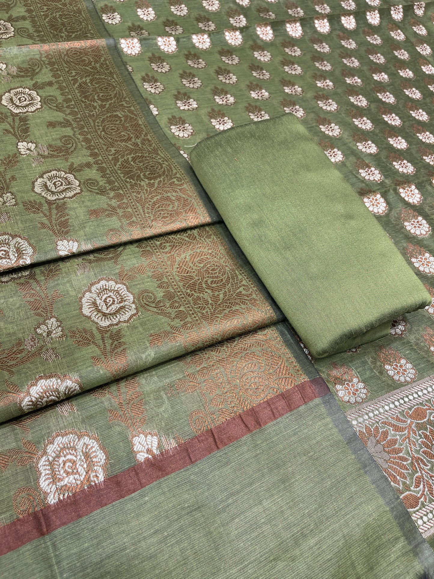 Pistachio green cotton suit set with floral resham mina bootis and matching dupatta. SHL_24