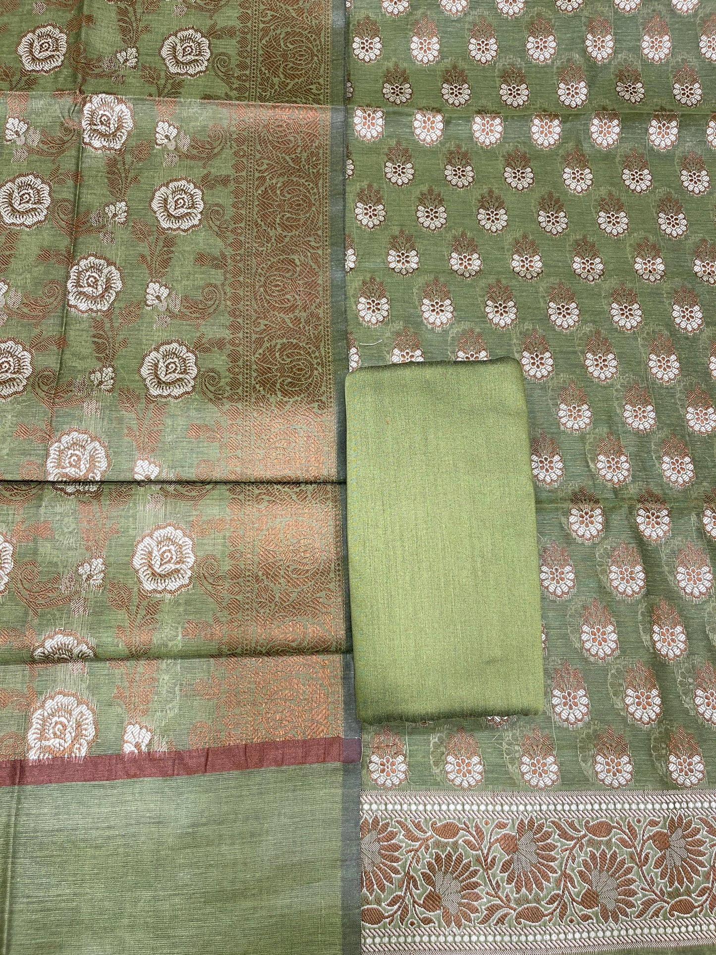 Pistachio green cotton suit set with floral resham mina bootis and matching dupatta. SHL_24