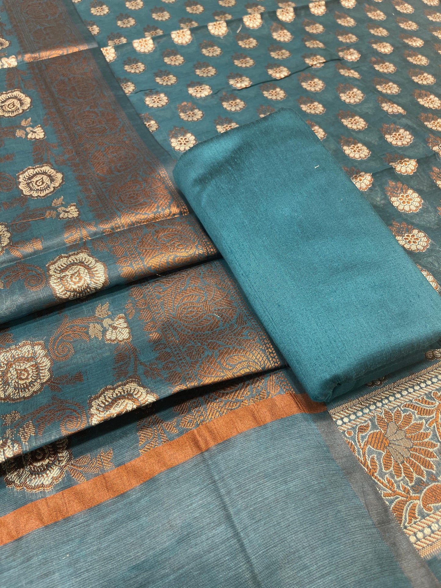 Dark seagreen cotton suit set with floral resham mina bootis and matching dupatta. SHL_26