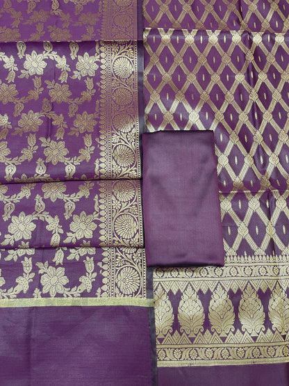 Purple art silk suit set with diagonal zari stripes and matching dupatta. SHL_56