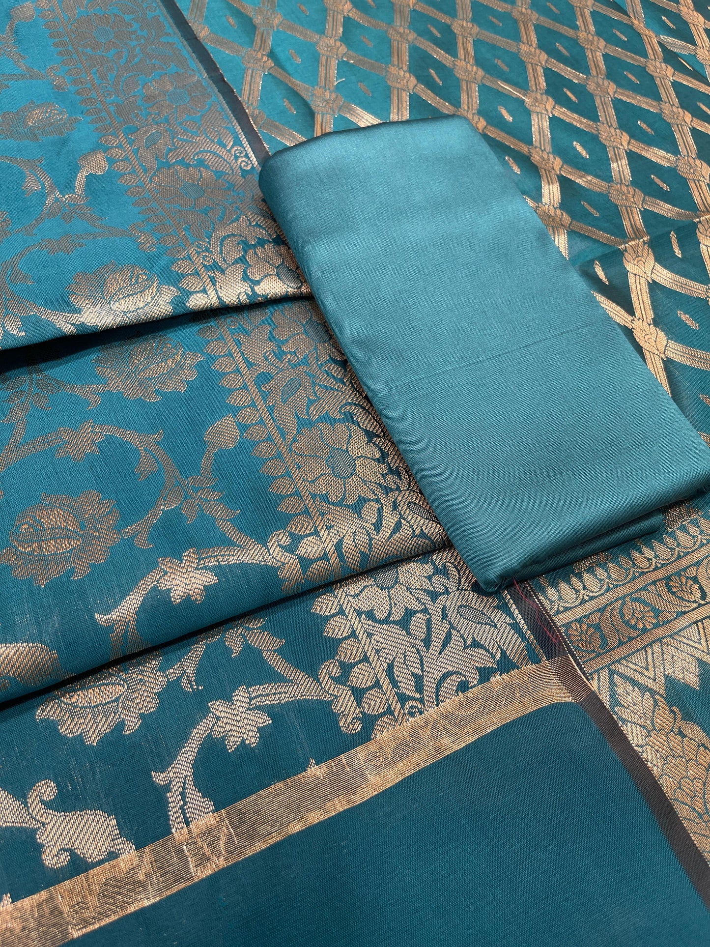 Dark seagreen art silk suit set with diagonal zari stripes and matching dupatta. SHL_51