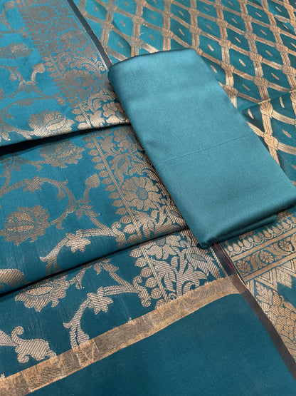 Dark seagreen art silk suit set with diagonal zari stripes and matching dupatta. SHL_51