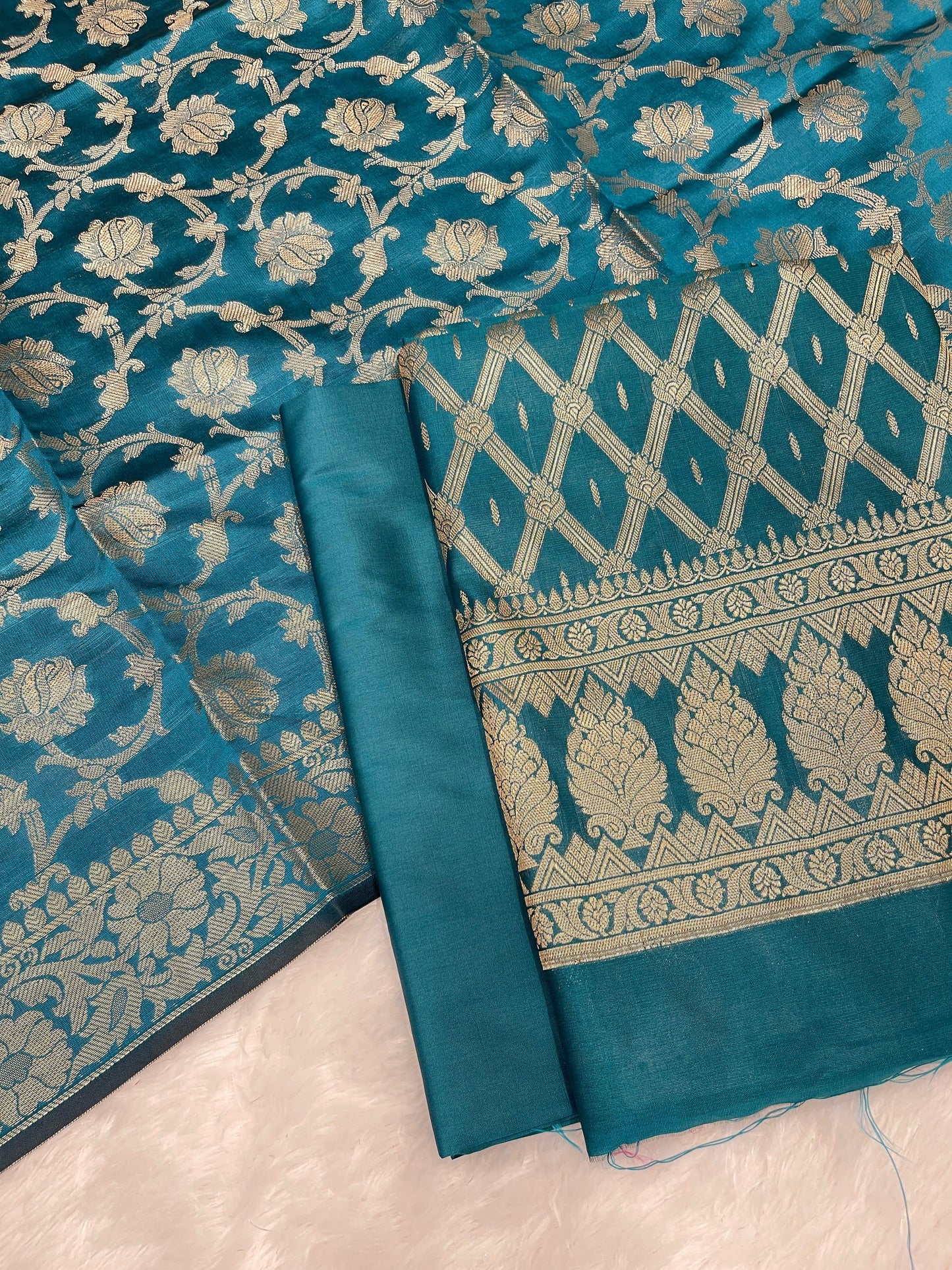 Dark seagreen art silk suit set with diagonal zari stripes and matching dupatta. SHL_51