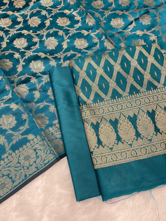 Dark seagreen art silk suit set with diagonal zari stripes and matching dupatta. SHL_51