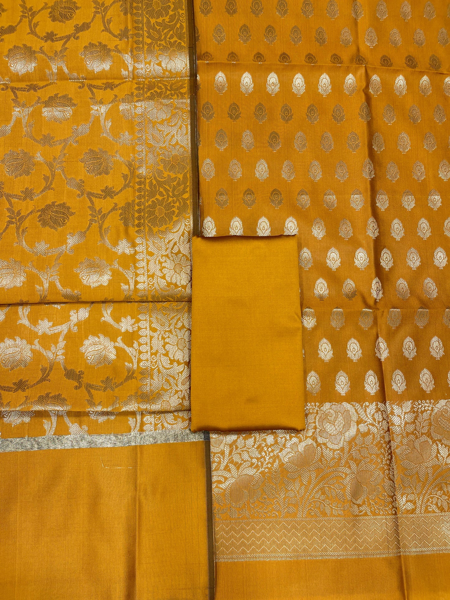 Light brown art silk suit set with floral zari bootis and matching dupatta. SHL_57