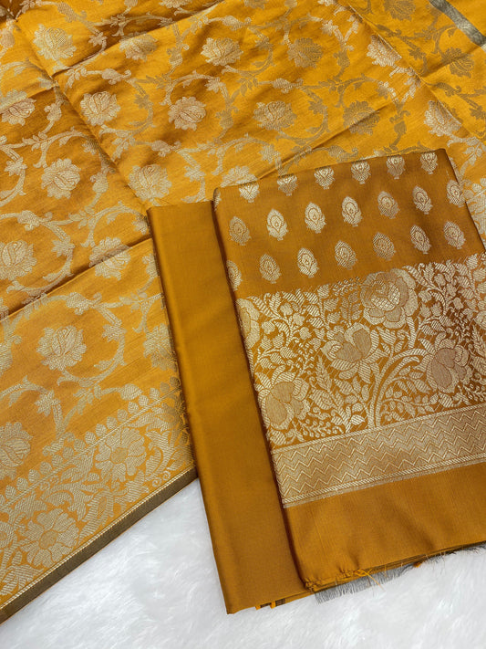 Light brown art silk suit set with floral zari bootis and matching dupatta. SHL_57