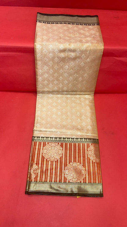 Faishana Presents Beige Silver Zari Kanchi Silk Brocade Contrast Orange Zari Pattu Border Banarasi Saree