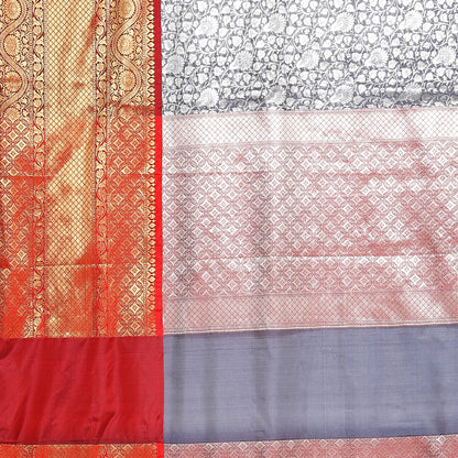 Faishana Presents Presents Navy Blue Zari Patola Contrast Zari Brocade Maroon Pattu Border Banarasi Saree.