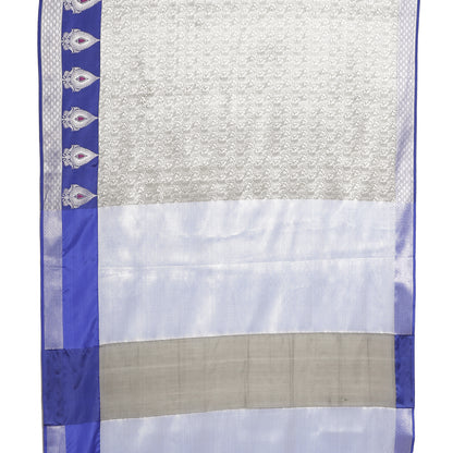 Faishana Presents Grey Silver Zari Kanchi Silk Tanchoi Brocade Contrast Blue Skirt Meena Border Banarasi Saree