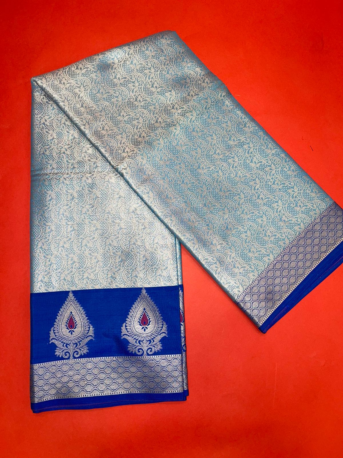 Faishana Presents Torqouise Blue Silver Zari Kanchi Silk Tanchoi Brocade Contrast Blue Skirt Meena Border Banarasi Saree