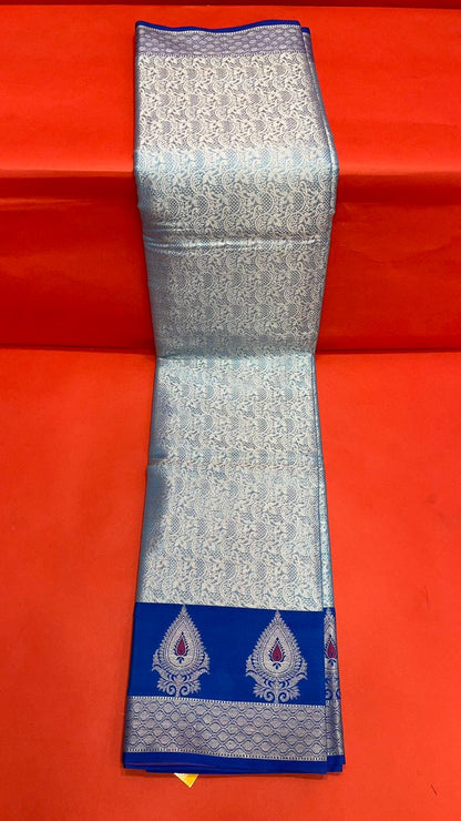 Faishana Presents Torqouise Blue Silver Zari Kanchi Silk Tanchoi Brocade Contrast Blue Skirt Meena Border Banarasi Saree