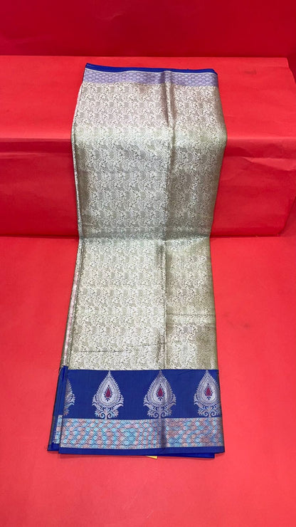 Faishana Presents Green Silver Zari Kanchi Silk Tanchoi Brocade Contrast Blue Skirt Meena Border Banarasi Saree