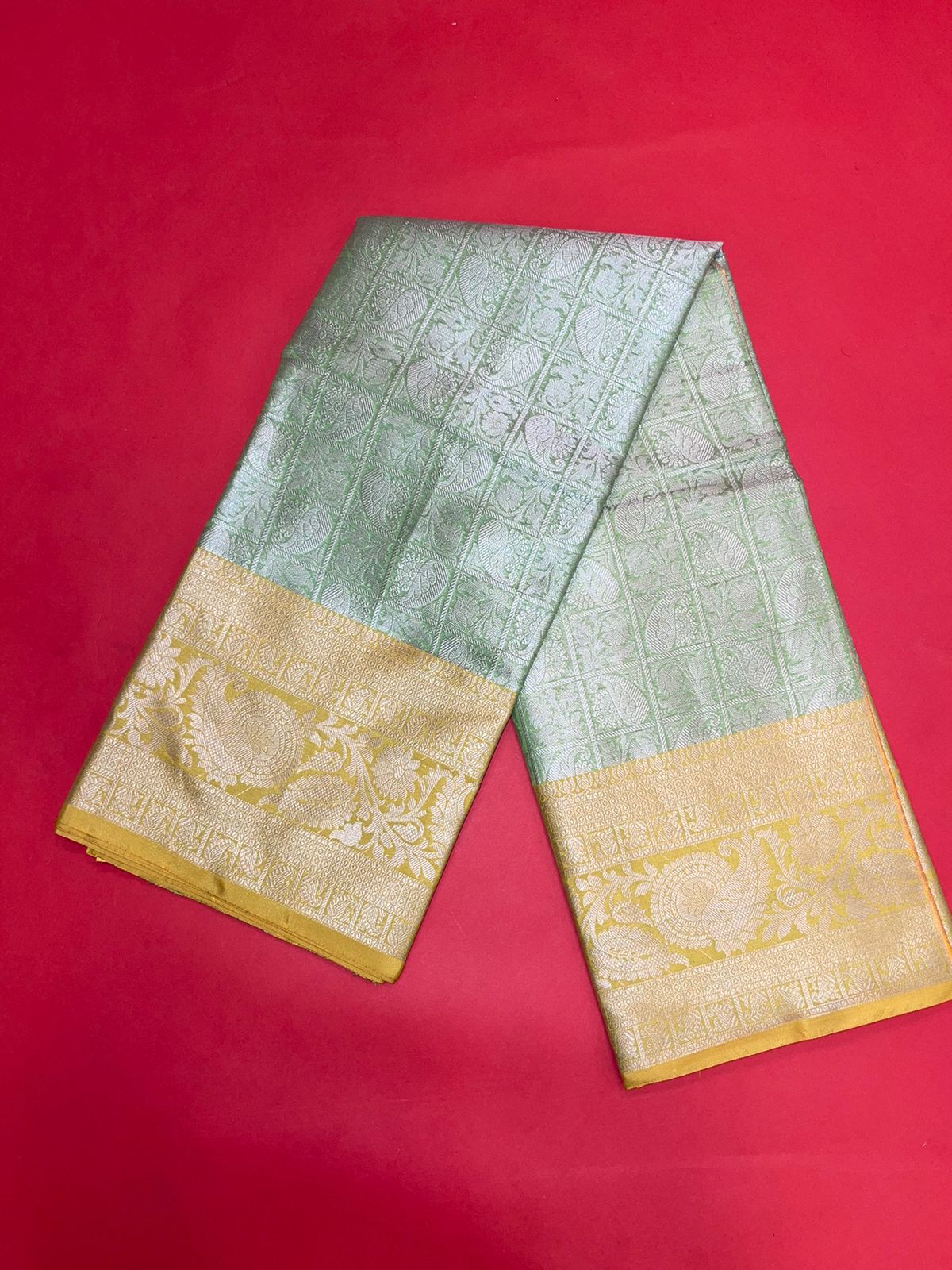Faishana Presents Green Silver Zari Kanchi Silk Tanchoi Brocade Contrast Gold Skirt Meena Border Banarasi Saree