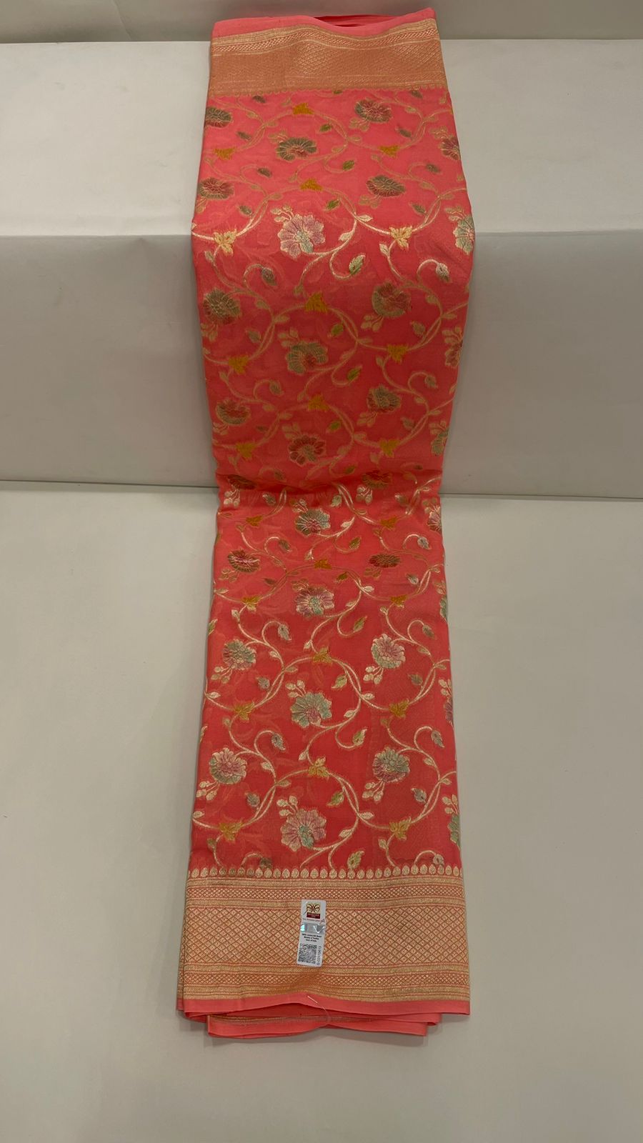 Radiant Threads: Faishana's Pure Silk Handloom Orange Khaddi Georgette Hand Brush Floral Zari Kadhwa Jaal with Banarasi Zari Border with an Orange Blouse