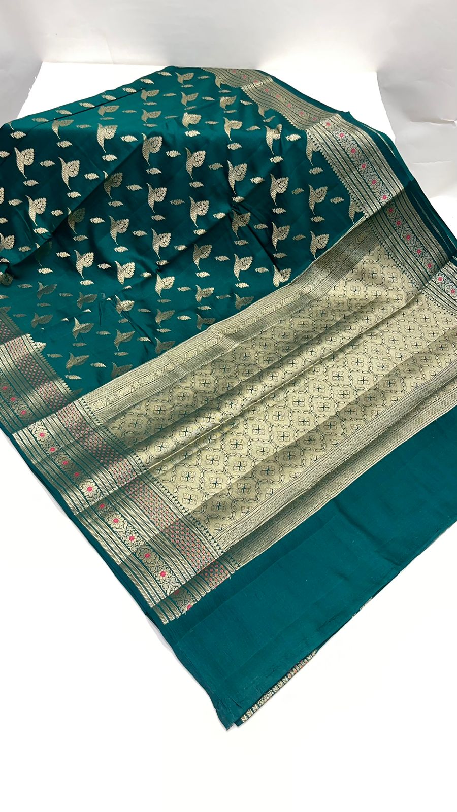 Enchanting Elegance: Faishana Pure Silk Handloom Dark Green Chiniya Silk Gold Floral Zari Booti with Minakari Border & Dark Green Blouse