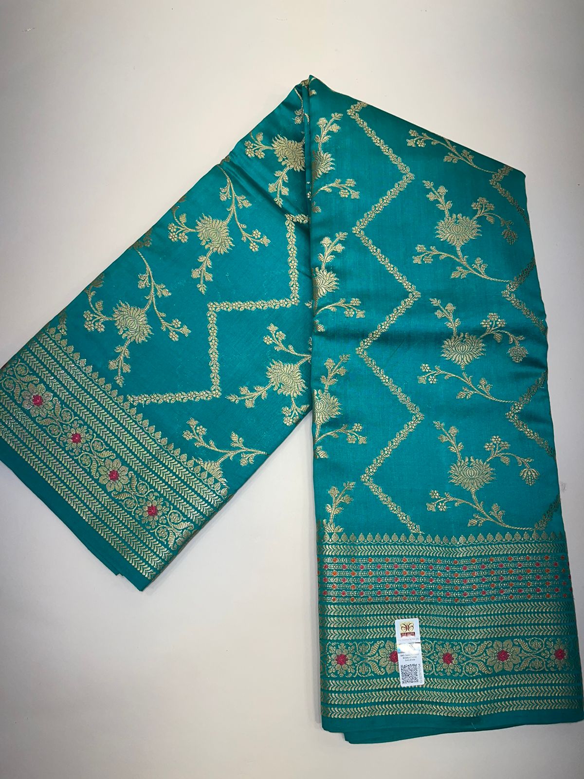 Oceanic Elegance: Faishana's Pure Silk Handloom Sea Green Pure Chiniya Silk Tilfi Zari Jaal Zig-Zag Saree with Minakari Zari Border with Sea Green Blouse Piece
