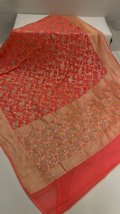 Radiant Threads: Faishana's Pure Silk Handloom Orange Khaddi Georgette Hand Brush Floral Zari Kadhwa Jaal with Banarasi Zari Border with an Orange Blouse