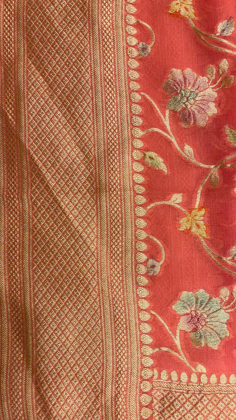 Radiant Threads: Faishana's Pure Silk Handloom Orange Khaddi Georgette Hand Brush Floral Zari Kadhwa Jaal with Banarasi Zari Border with an Orange Blouse