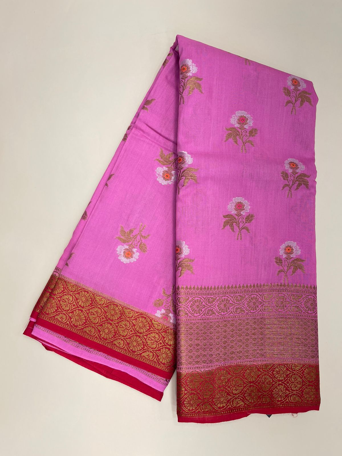 Radiant Elegance: Faishana Pure Silk Handloom Pink Muga Silk Saree with Zari Mina Floral Booti and Contrasting Red Anchal Copper Zari Border and Paired with a Red Blouse