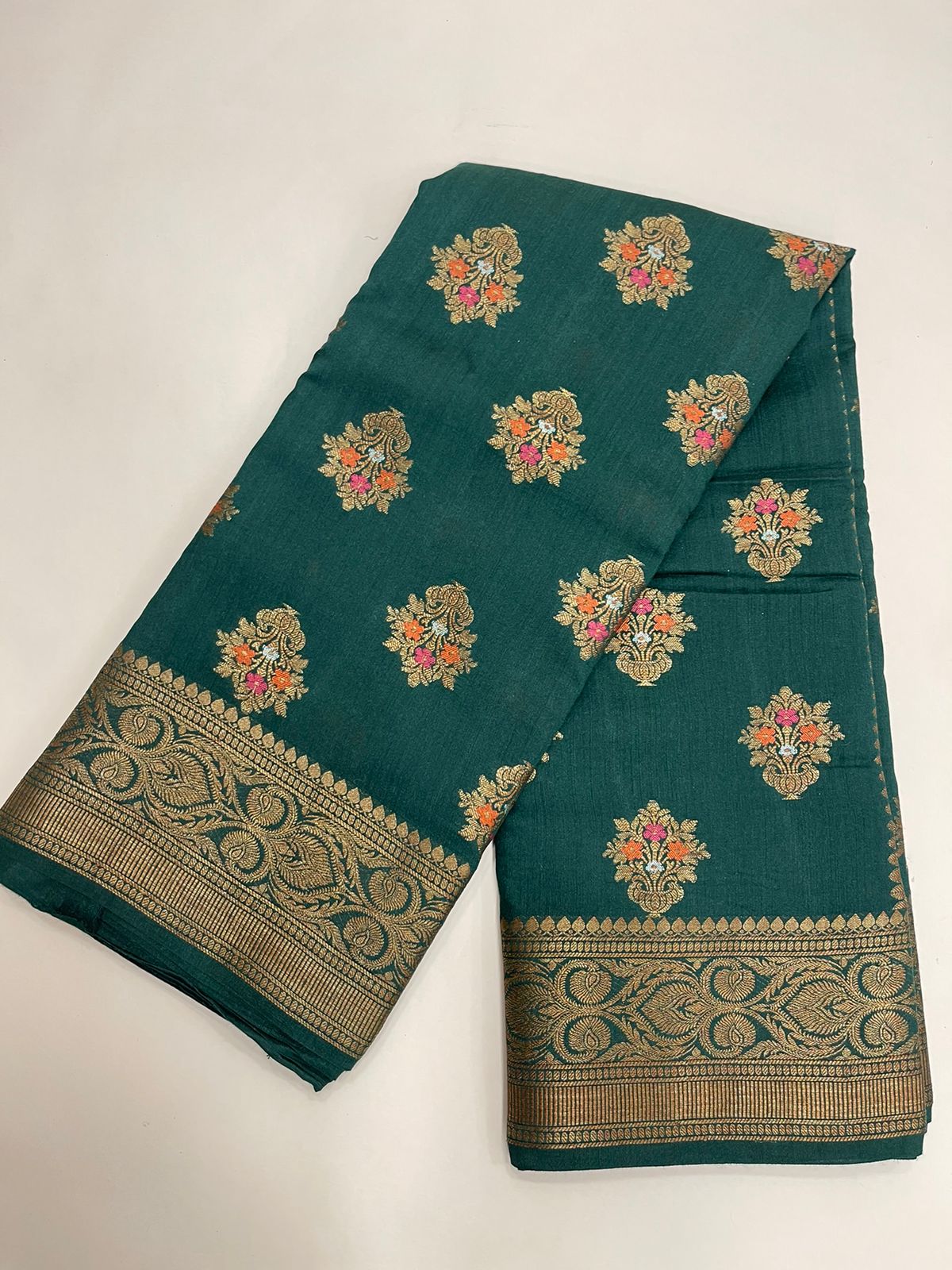 Emerald Elegance: Faishana Pure Silk Handloom Dark Green Munga Silk Minakari Zari Boota Banarasi Saree paired with Dark Green Blouse