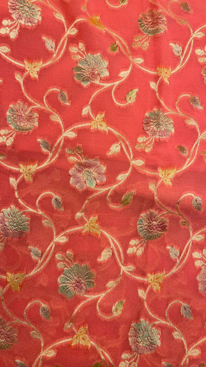 Radiant Threads: Faishana's Pure Silk Handloom Orange Khaddi Georgette Hand Brush Floral Zari Kadhwa Jaal with Banarasi Zari Border with an Orange Blouse