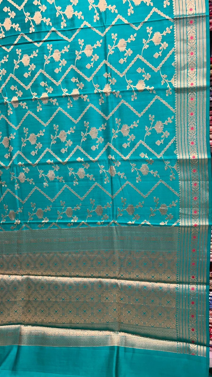 Oceanic Elegance: Faishana's Pure Silk Handloom Sea Green Pure Chiniya Silk Tilfi Zari Jaal Zig-Zag Saree with Minakari Zari Border with Sea Green Blouse Piece