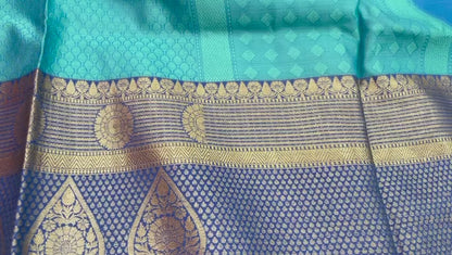 Faishana Turquoise Blue Resham Brocade Saree With Contrast Blue Zari Pattu Border