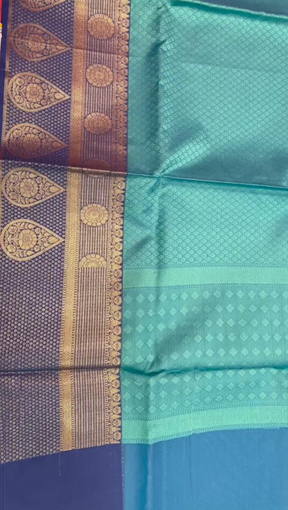 Faishana Turquoise Blue Resham Brocade Saree With Contrast Blue Zari Pattu Border