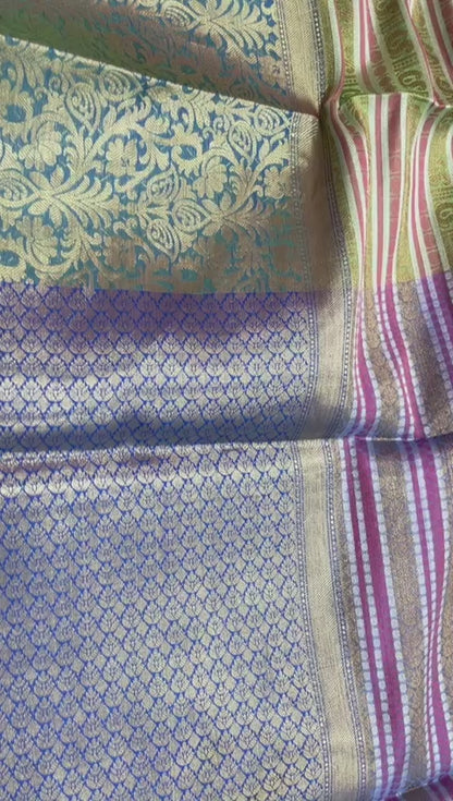 Faishana Presents Green Zari Strip Kanchi Silk Tanchoi Brocade Contrast Torqouise Blue Skirt Border Banarasi Saree